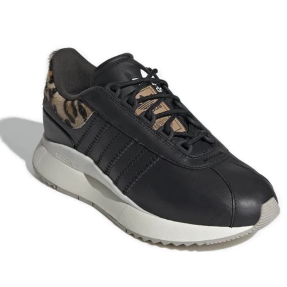Adidas cheetah/ leopard black leather shoes women’s 7.5 fit like an 8.5 like new